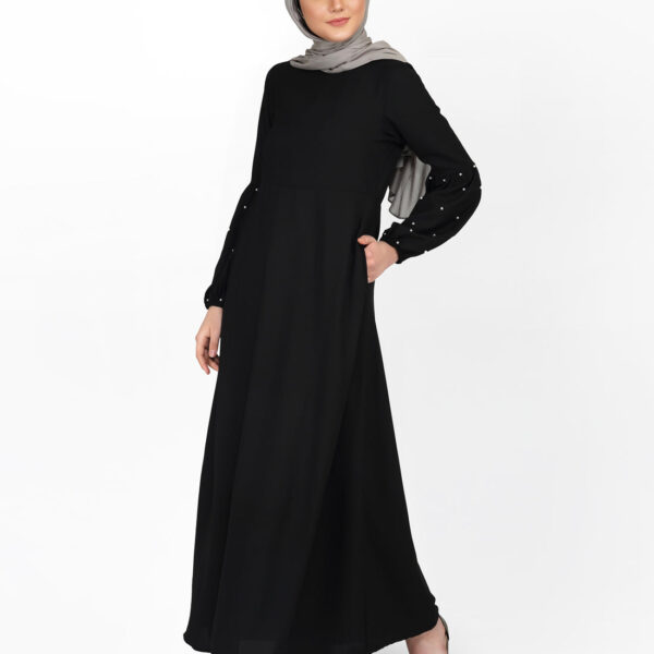 Front view of pearl embellished black puffed sleeve abaya – modest abaya design