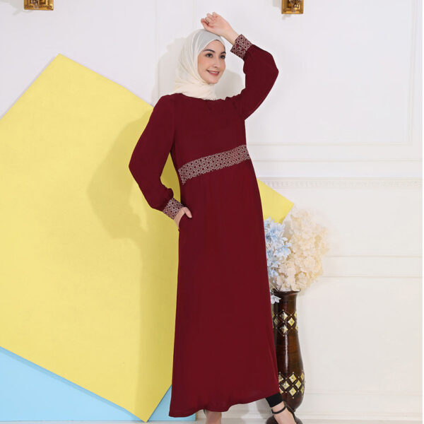 Front view of ruby red embroidered abaya – modest abaya design