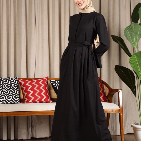 Front view of black luxe flared maxi dress – modest abaya design