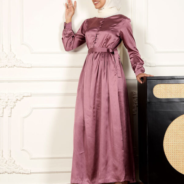 Front view of peach blossom flared satin maxi dress – modest abaya design